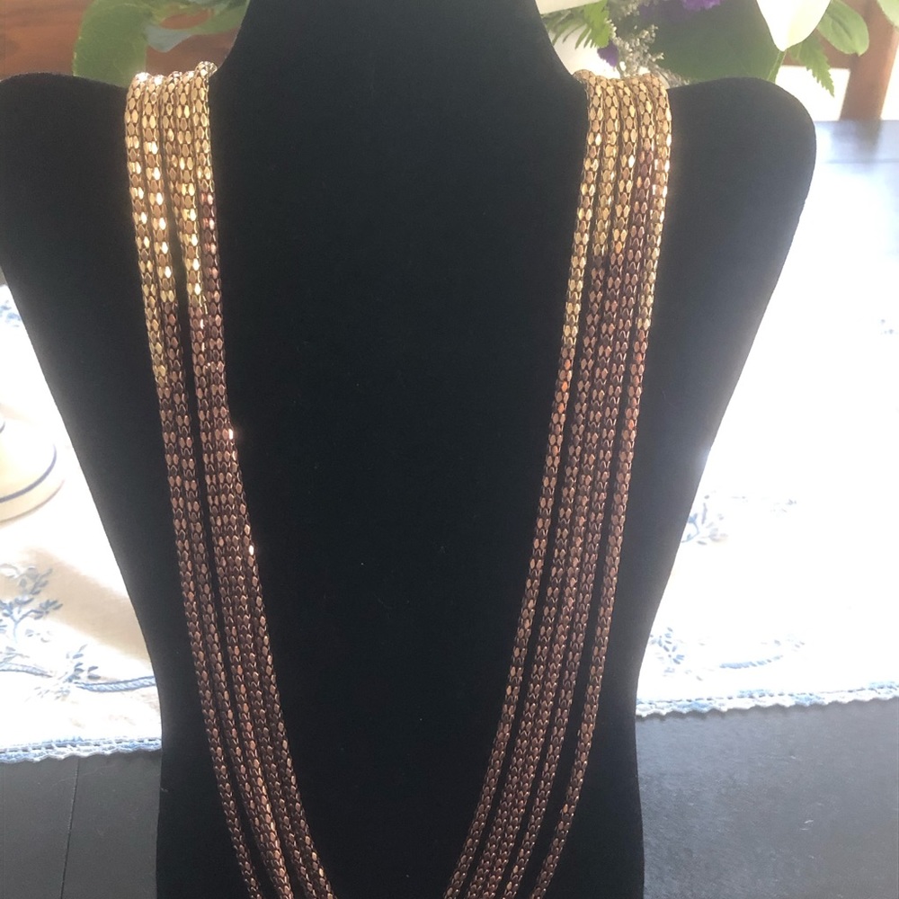 R.J. Graziano multi strand two toned necklace.
